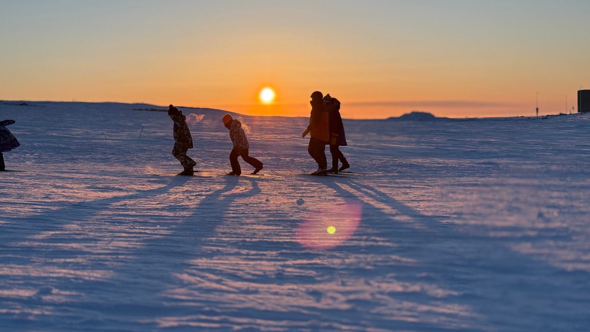 early sunset after a day of skiing